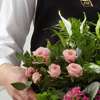 The FTD® Florist Designed Sympathy Dishgarden Flower Bouquet