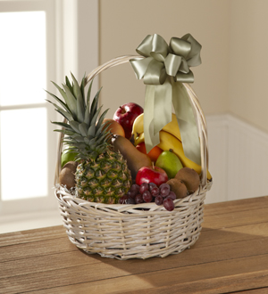The FTD® Sincerest Sympathy™ Gourmet Basket Flower Bouquet